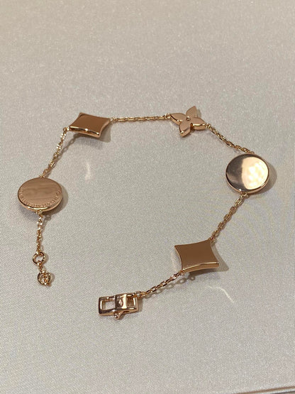 [Kincade Jewelery]STAR AND SUN 5 MOTIF MOP PINK GOLD BRACELET